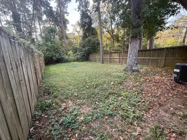 a view of a backyard with a trees