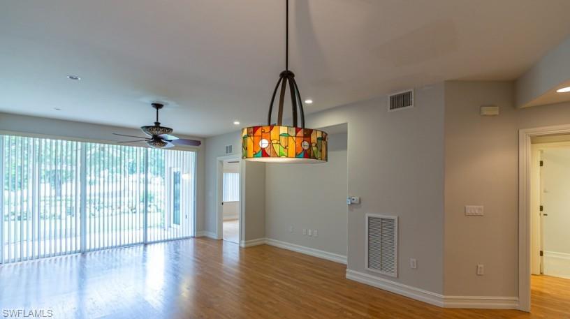 9113 Michael Circle, Unit 9 Naples, FL 34113 - Photo 14 of 28 a view of an entryway with wooden floor