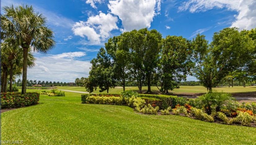 9113 Michael Circle, Unit 9 Naples, FL 34113 - Photo 25 of 28 a view of a park with large trees