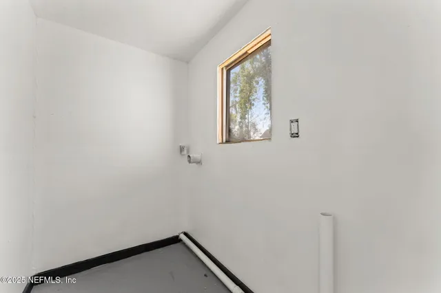 a view of a small space with a window