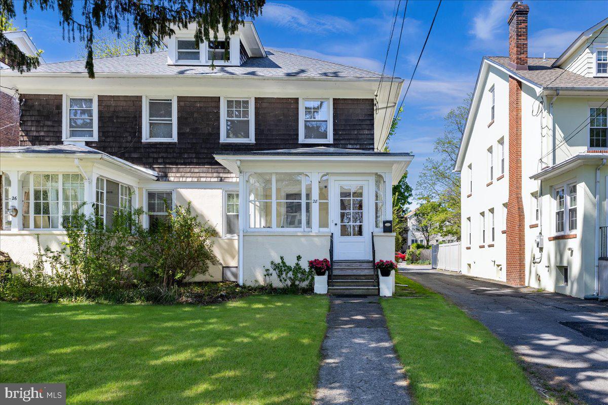 28 Jefferson Road Princeton, NJ 08540 - Photo 1 of 25 a front view of a house with a yard