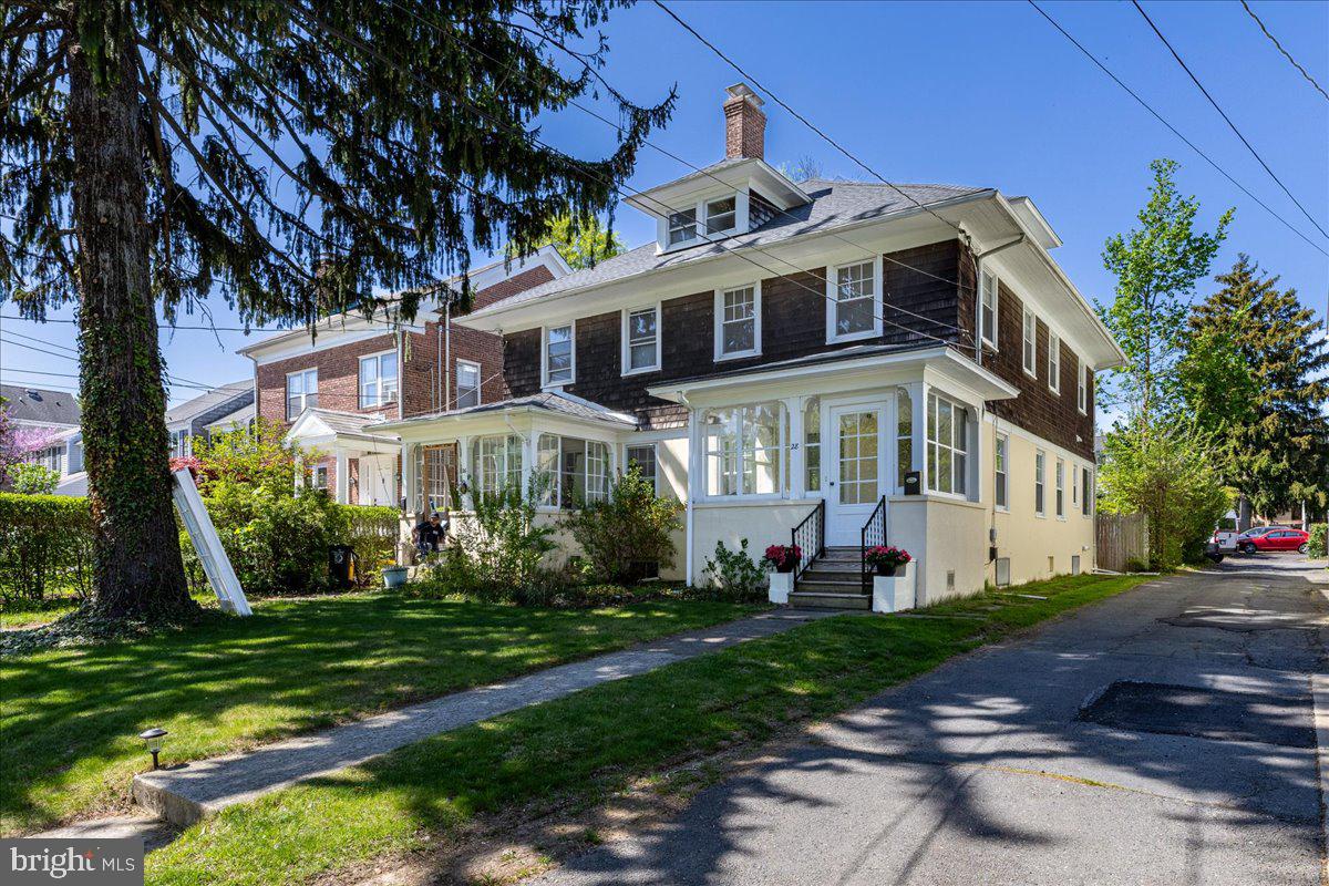 28 Jefferson Road Princeton, NJ 08540 - Photo 3 of 25 a front view of a house with a yard