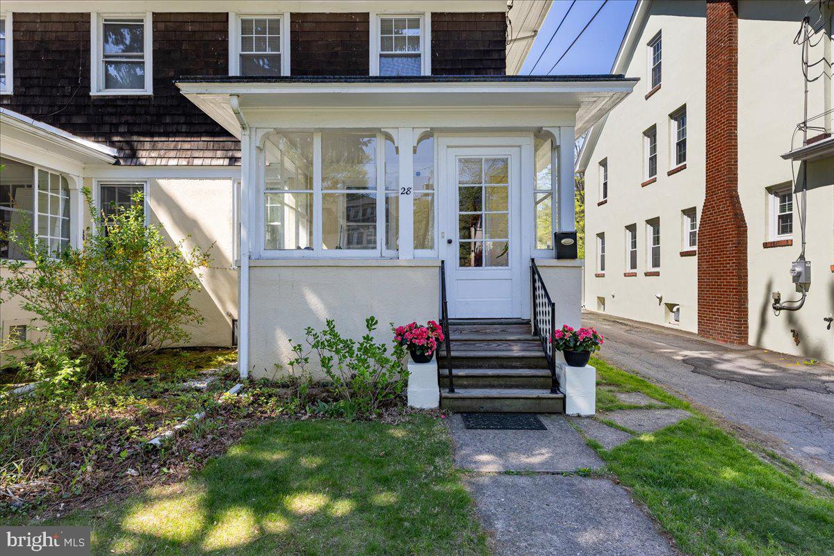 28 Jefferson Road Princeton, NJ 08540 - Photo 4 of 25 a front view of a house with a yard