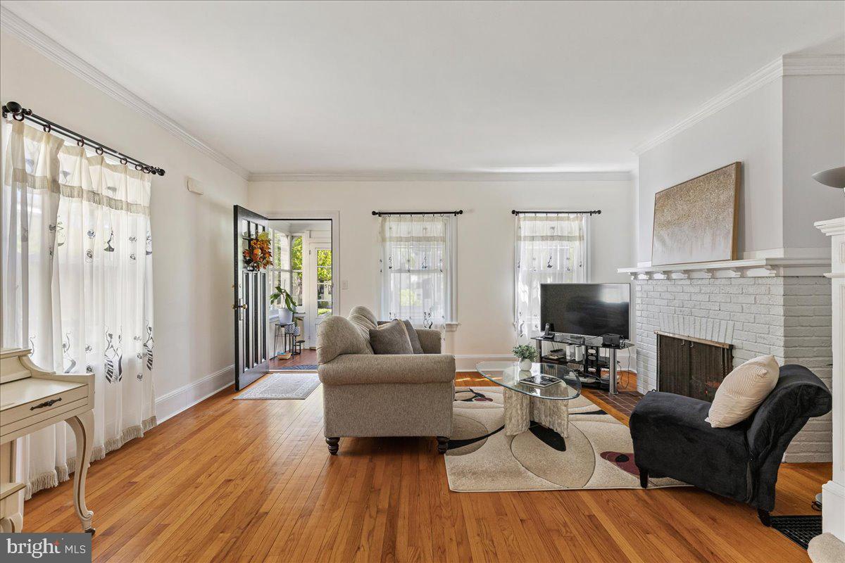 28 Jefferson Road Princeton, NJ 08540 - Photo 9 of 25 a living room with furniture fireplace and a flat screen tv