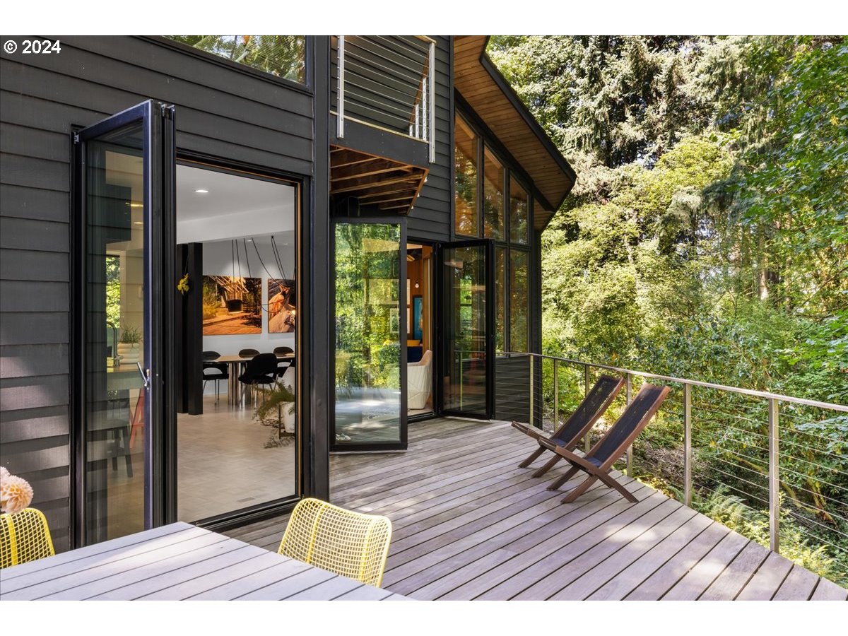 3204 Southwest Upper Cascade Drive Portland, OR 97205 - Photo 11 of 40 a view of living room and balcony