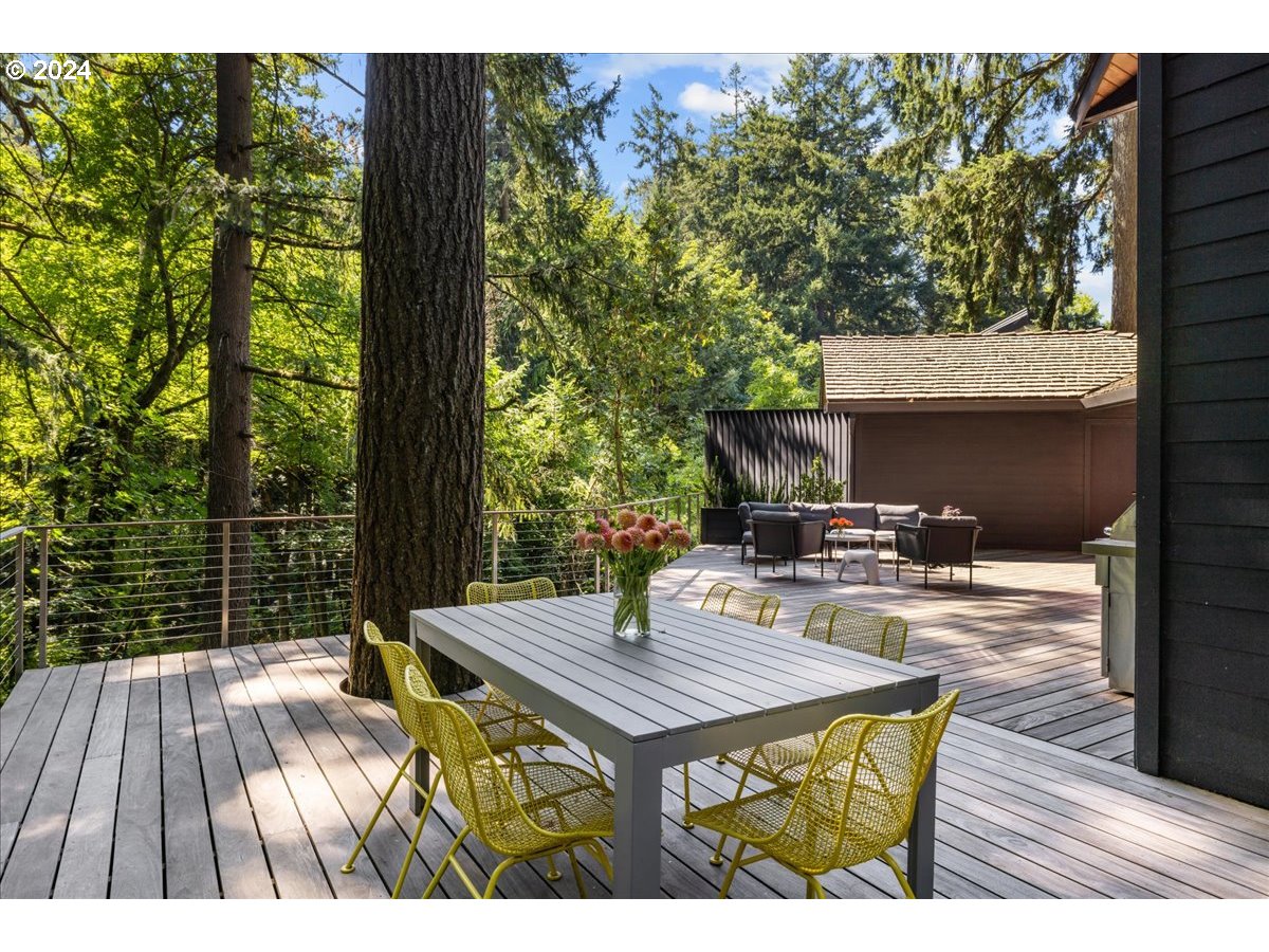 3204 Southwest Upper Cascade Drive Portland, OR 97205 - Photo 12 of 40 a view of house with backyard patio and outdoor seating