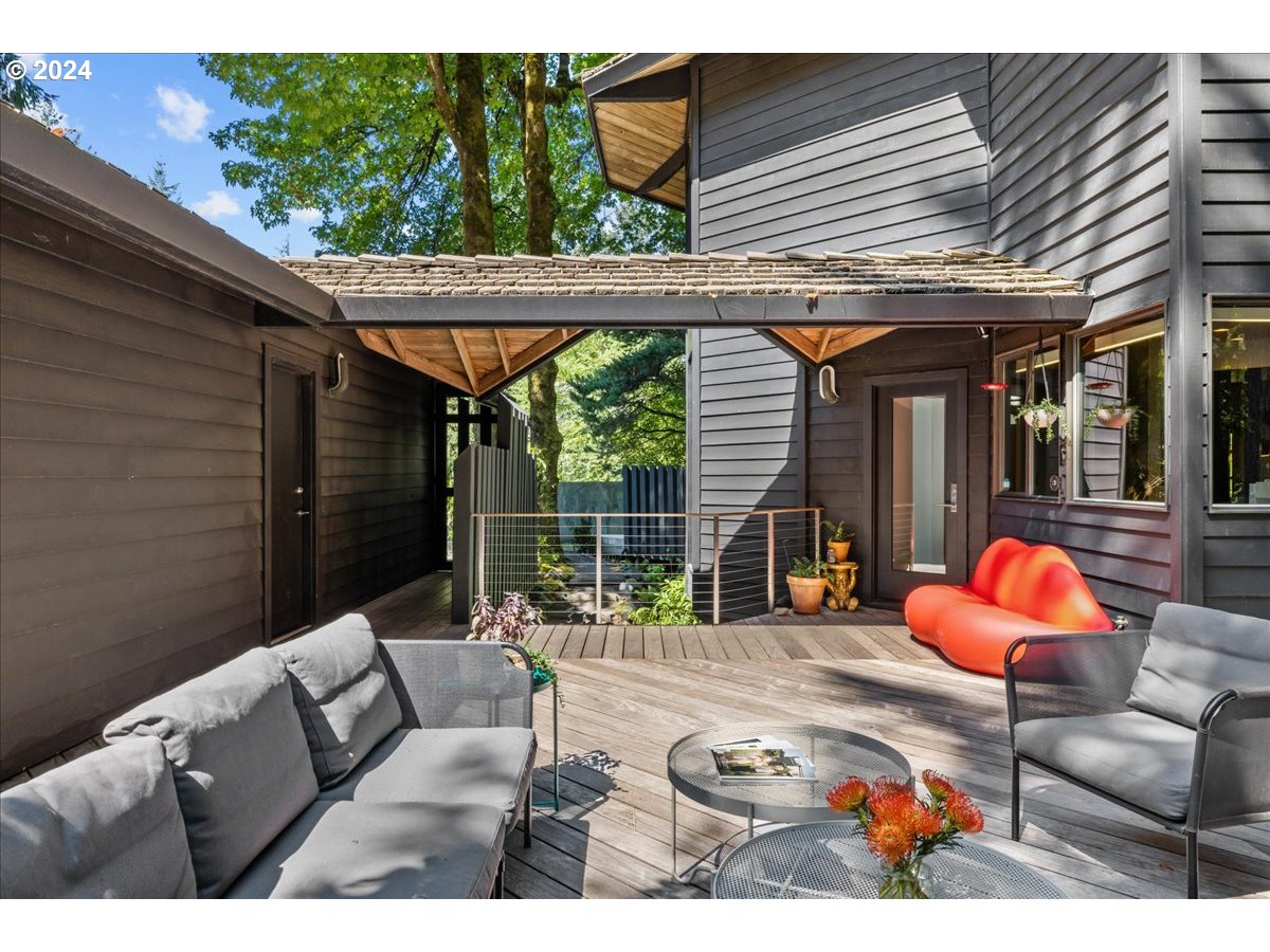 3204 Southwest Upper Cascade Drive Portland, OR 97205 - Photo 14 of 40 a outdoor living space with furniture and garden view