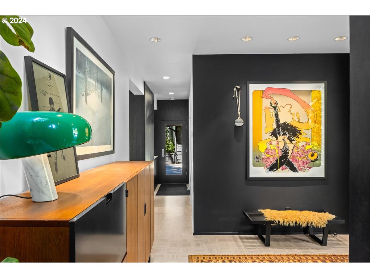 3204 Southwest Upper Cascade Drive Portland, OR 97205 - Photo 16 of 40 a outdoor space with furniture and a potted plant