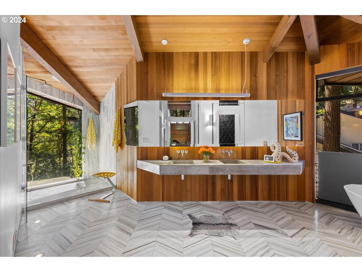 3204 Southwest Upper Cascade Drive Portland, OR 97205 - Photo 23 of 40 a view of a living room and kitchen