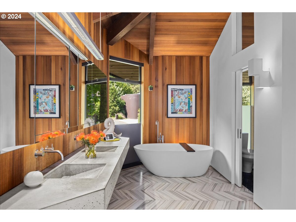 3204 Southwest Upper Cascade Drive Portland, OR 97205 - Photo 25 of 40 a living room with furniture and a large window