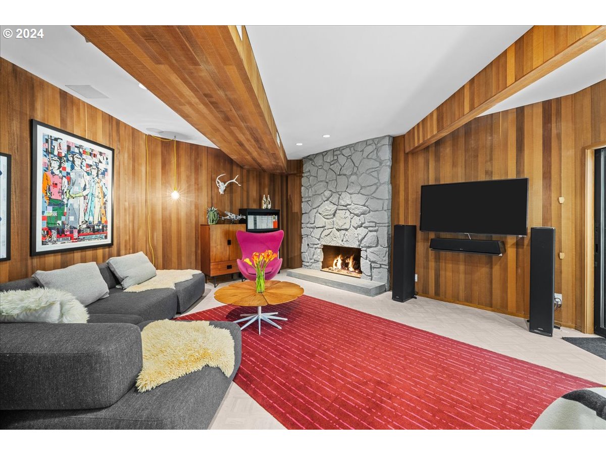 3204 Southwest Upper Cascade Drive Portland, OR 97205 - Photo 28 of 40 a living room with furniture and a fireplace