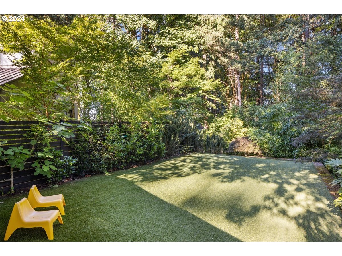 3204 Southwest Upper Cascade Drive Portland, OR 97205 - Photo 36 of 40 a view of a yard in front of a house