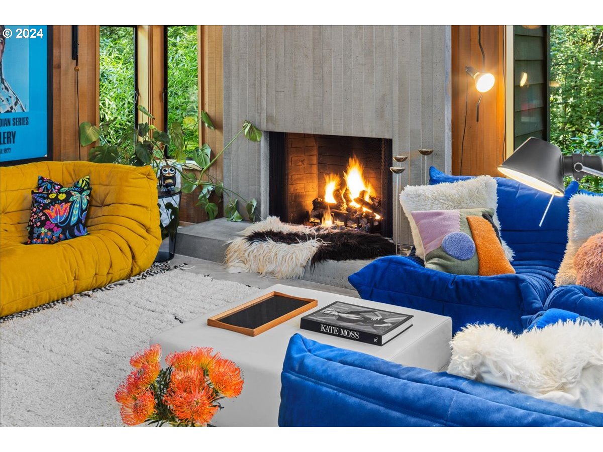 3204 Southwest Upper Cascade Drive Portland, OR 97205 - Photo 5 of 40 a living room with furniture and a fireplace