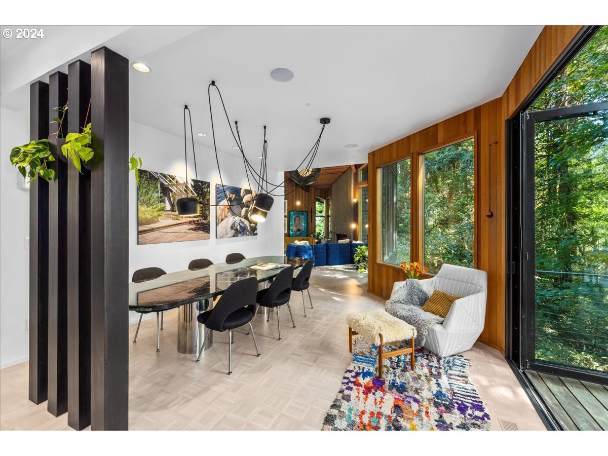3204 Southwest Upper Cascade Drive Portland, OR 97205 - Photo 6 of 40 a living room with furniture and a large window