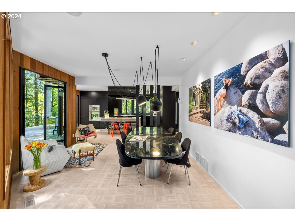 3204 Southwest Upper Cascade Drive Portland, OR 97205 - Photo 7 of 40 a living room with furniture and a flat screen tv