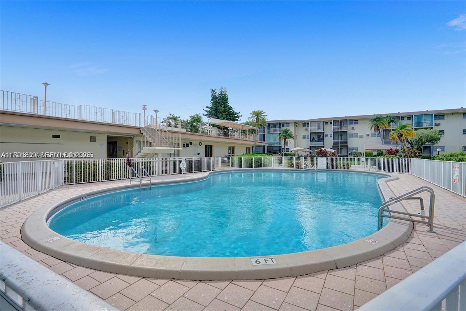 1355 Northeast 167th Street, Unit 302 Miami, FL 33162 - Photo 3 of 18