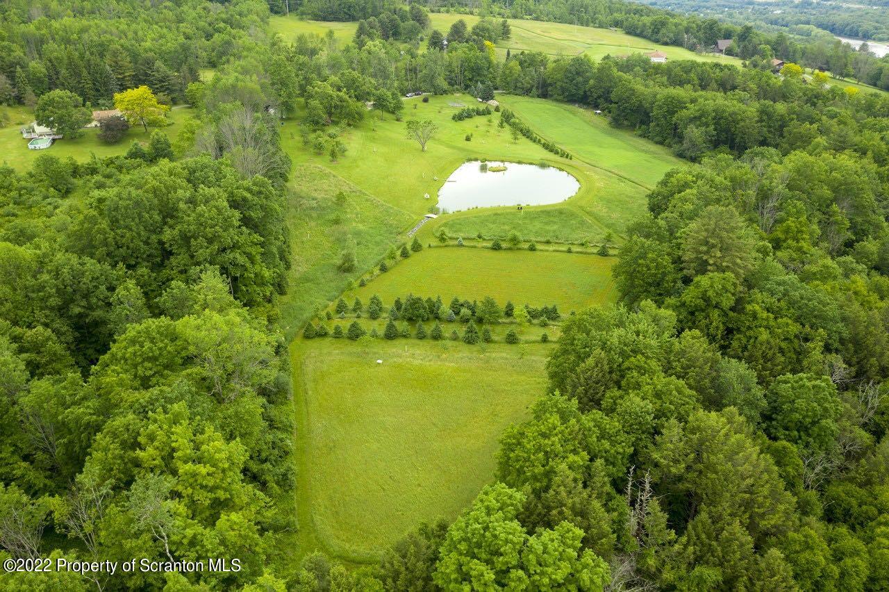487 Baptist Hill Road Hallstead, PA 18822 - Photo 53 of 53 a view of a lake with a yard