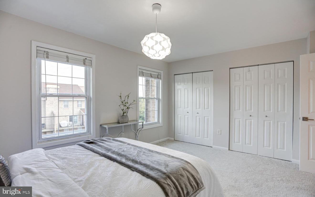 927 South Rolfe Street, Unit 2 Arlington, VA 22204 - Photo 14 of 17 a bedroom with a bed and a window