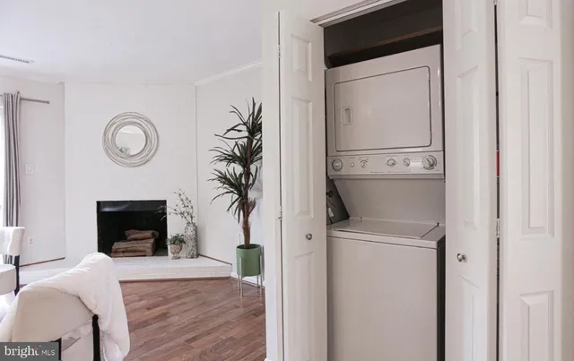 a view of a livingroom with furniture and a fireplace