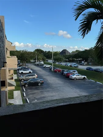 a view of a patio with swimming pool table and chairs