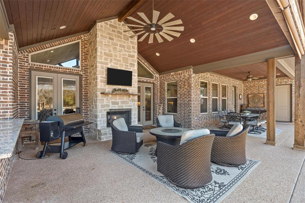 18503 Wortham Bend Road China Spring, TX 76633 - Photo 26 of 40 a living room with furniture and a fireplace