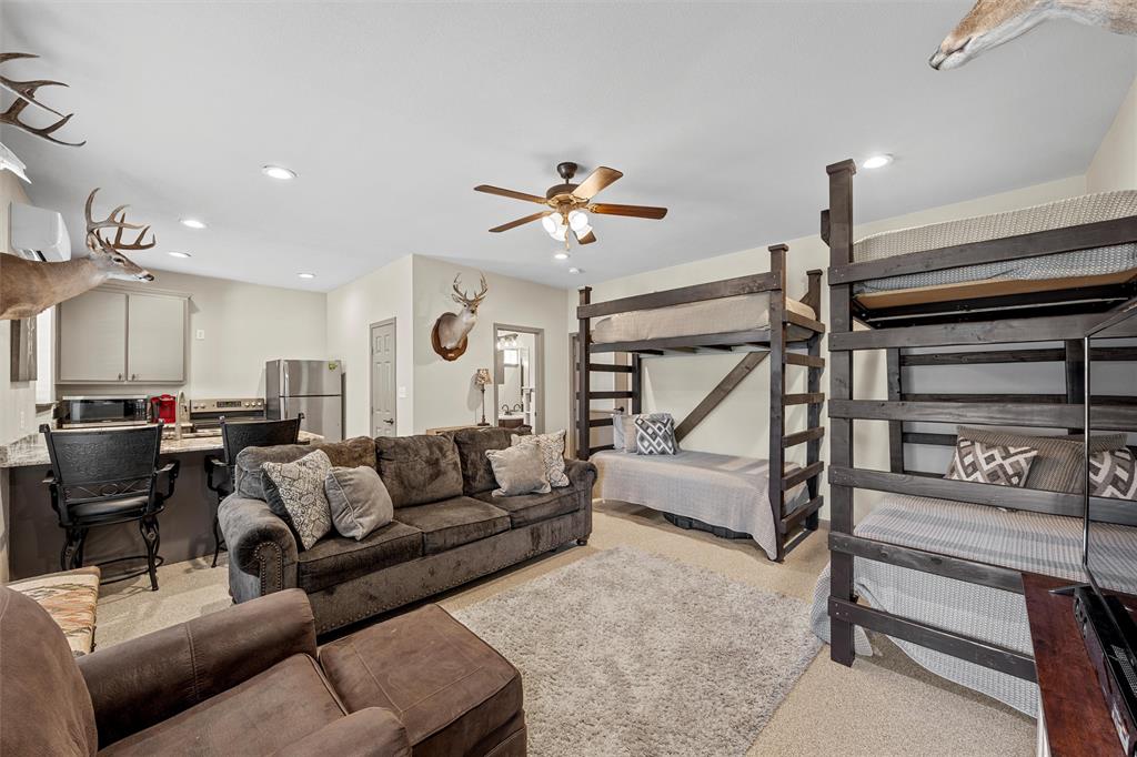 18503 Wortham Bend Road China Spring, TX 76633 - Photo 31 of 40 a living room with furniture and a ceiling fan
