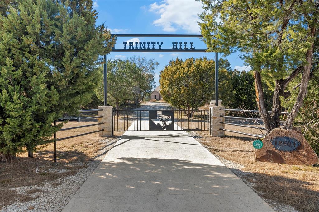 18503 Wortham Bend Road China Spring, TX 76633 - Photo 36 of 40 a view of a street with benches in the background