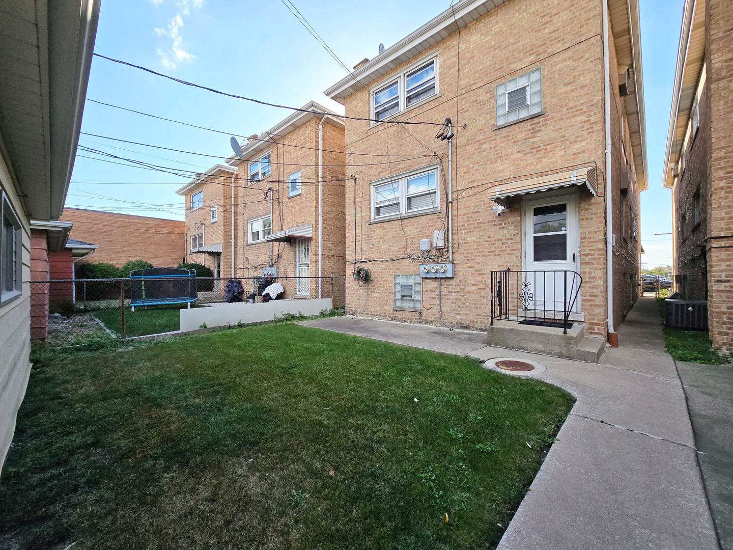 5972 South Archer Avenue, Unit GN Chicago, IL 60638 - Photo 16 of 16 a view of a back yard of the house