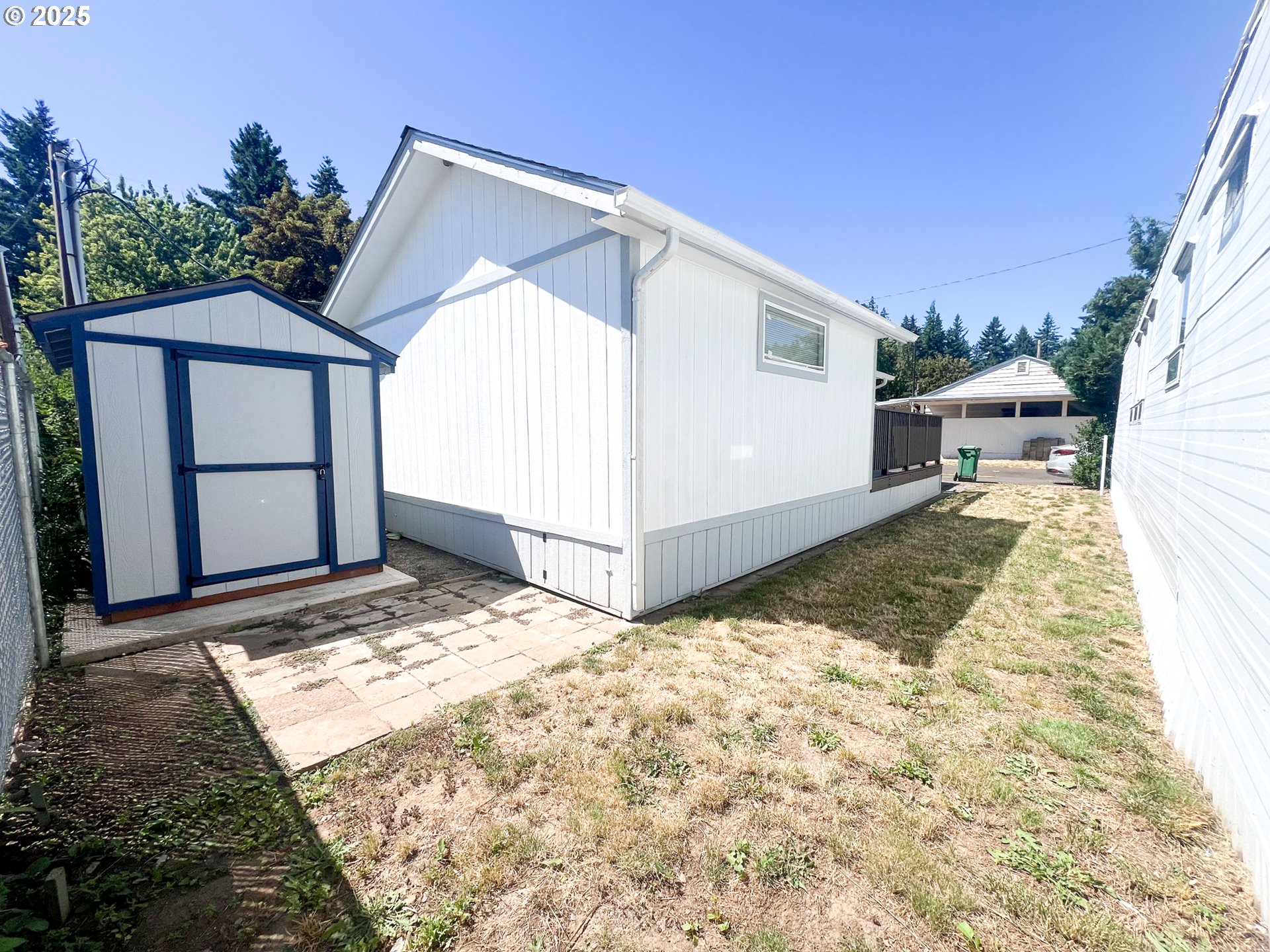 10901 Southeast Powell Boulevard, Unit 33 Portland, OR 97266 - Photo 11 of 12 a view of a house with a yard