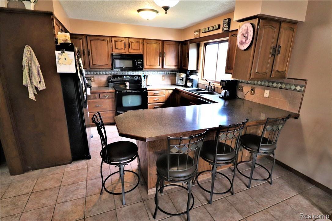 12161 Elms Road Clio, MI 48420 - Photo 18 of 23 Kitchen.jpg