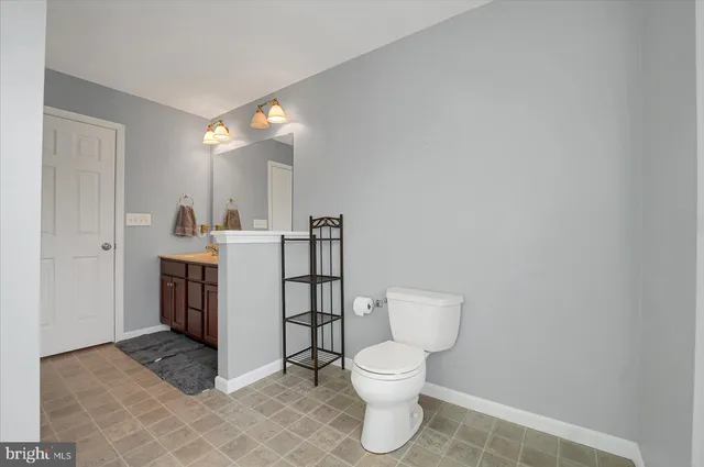 a room with furniture and a flat screen tv