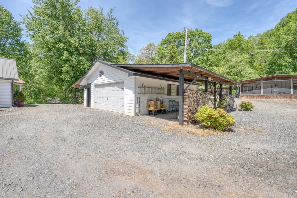 710 Town Mountain Road Hayesville, NC 28904 - Photo 17 of 68 a view of a house with a outdoor space