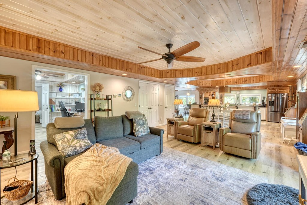 710 Town Mountain Road Hayesville, NC 28904 - Photo 24 of 68 a living room with furniture and a large window