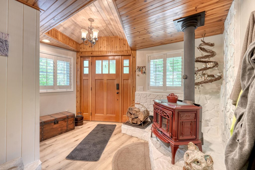 710 Town Mountain Road Hayesville, NC 28904 - Photo 28 of 68 a spacious bedroom with a bed and a window