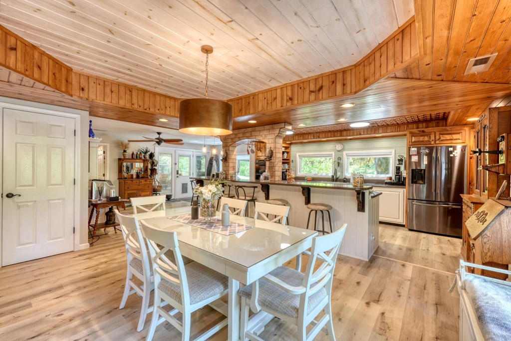 710 Town Mountain Road Hayesville, NC 28904 - Photo 31 of 68 a dining room with lots of wooden furniture