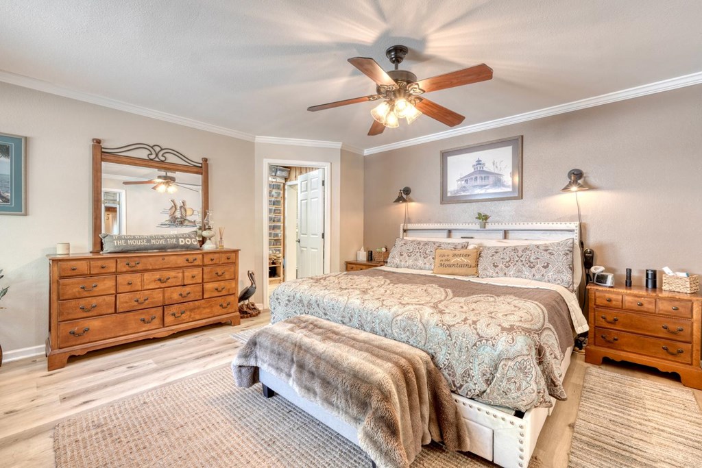 710 Town Mountain Road Hayesville, NC 28904 - Photo 44 of 68 a bedroom with a bed and wooden floor