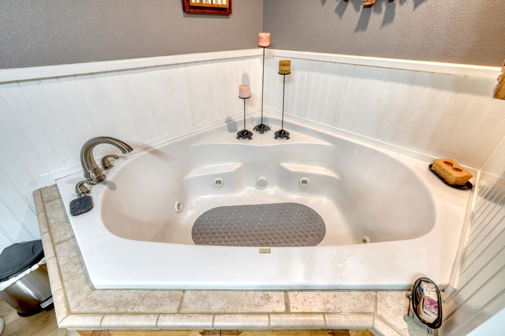 710 Town Mountain Road Hayesville, NC 28904 - Photo 45 of 68 a bathroom with a bathtub and a sink