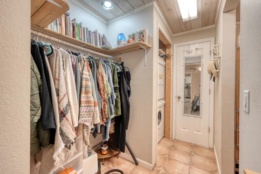 710 Town Mountain Road Hayesville, NC 28904 - Photo 49 of 68 a view of walk in closet with clothes and shoes