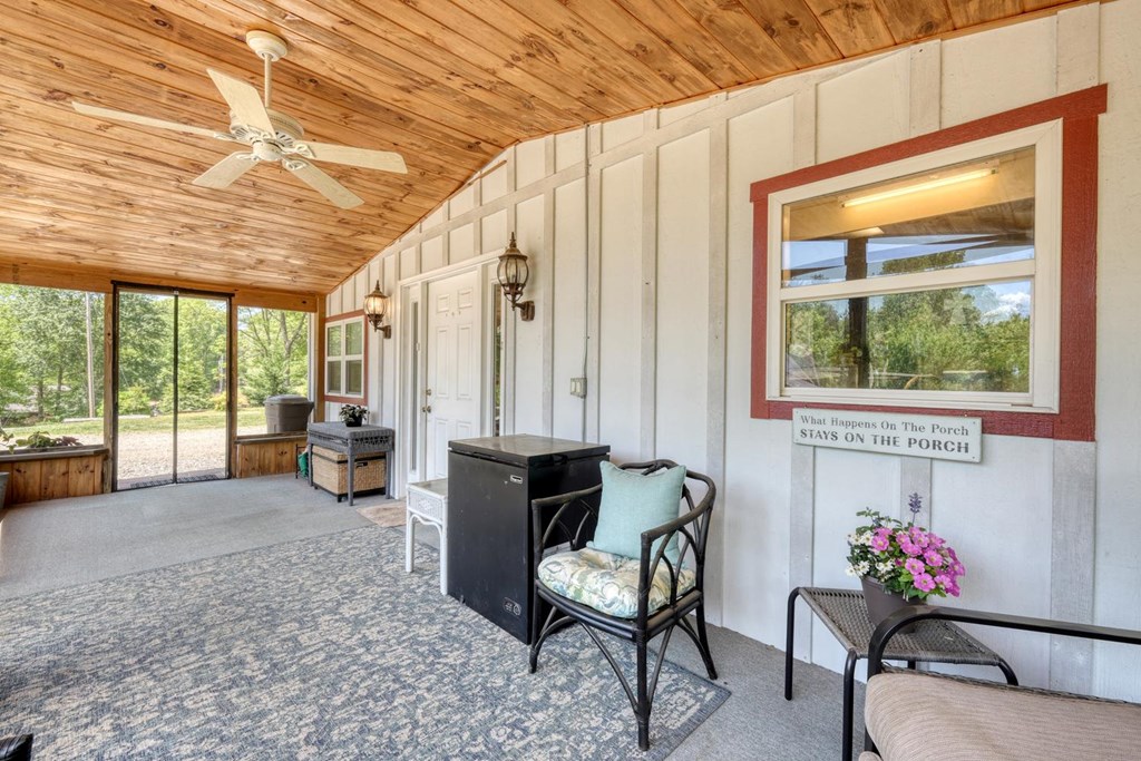 710 Town Mountain Road Hayesville, NC 28904 - Photo 53 of 68 a living room with furniture and a large window