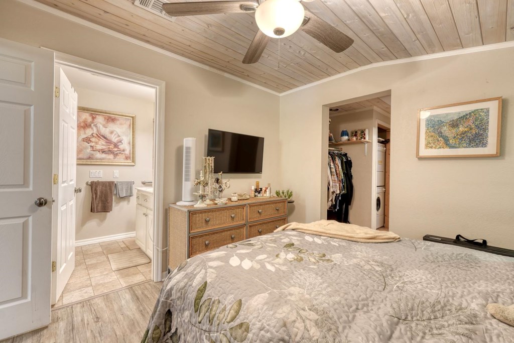 710 Town Mountain Road Hayesville, NC 28904 - Photo 58 of 68 a bedroom with a bed and a flat screen tv
