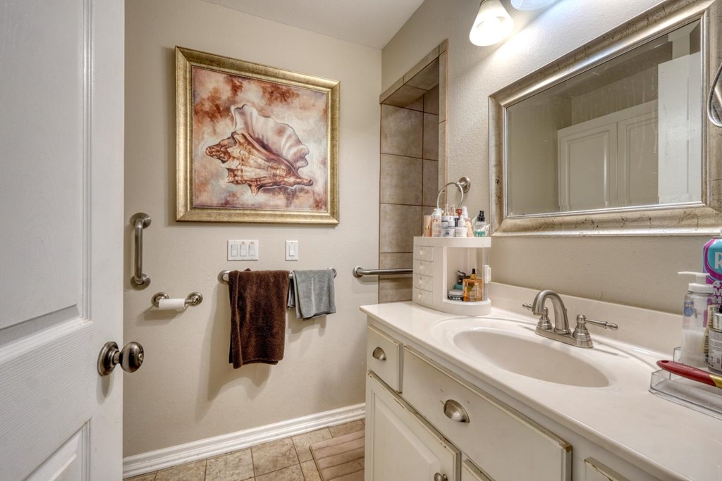 710 Town Mountain Road Hayesville, NC 28904 - Photo 61 of 68 a bathroom with a sink and a mirror