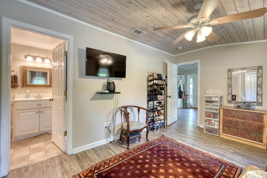 710 Town Mountain Road Hayesville, NC 28904 - Photo 63 of 68 a living room with furniture and a flat screen tv