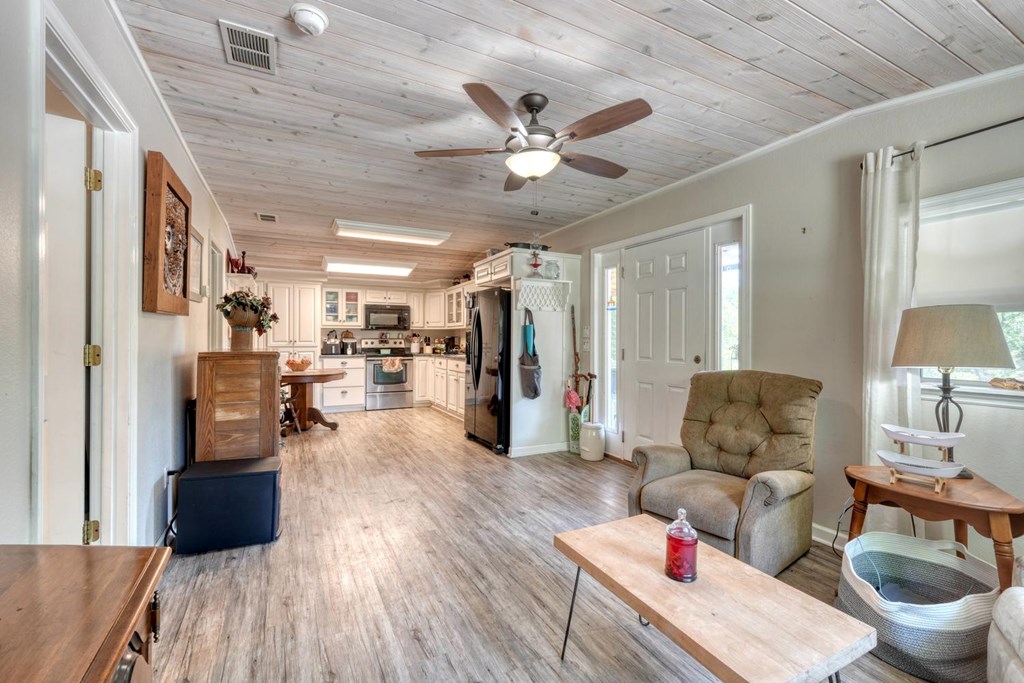 710 Town Mountain Road Hayesville, NC 28904 - Photo 67 of 68 a living room with furniture and a wooden floor
