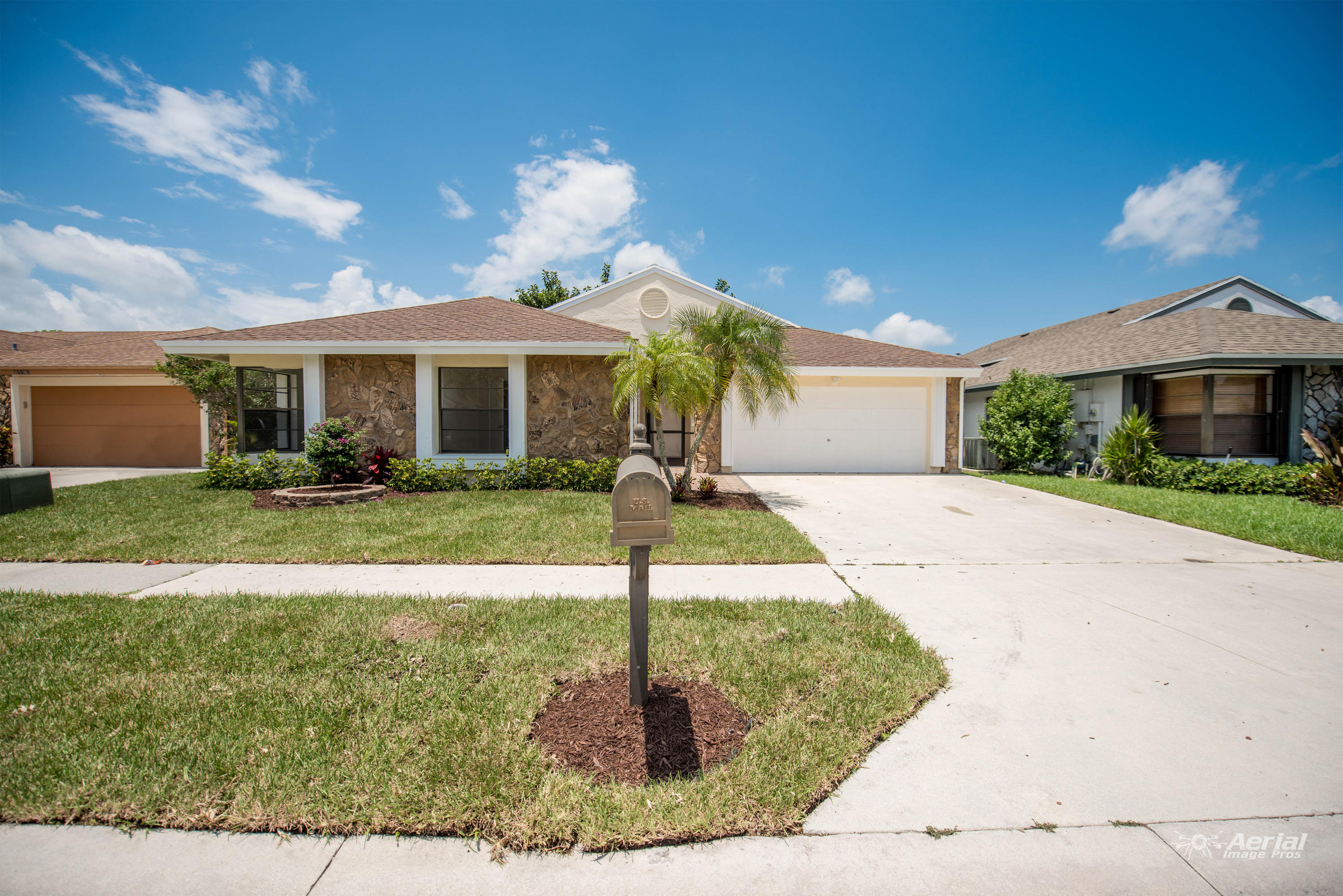 21091 Woodspring Avenue Boca Raton, FL 33428 - Photo 1 of 41 frontwithsignremoved