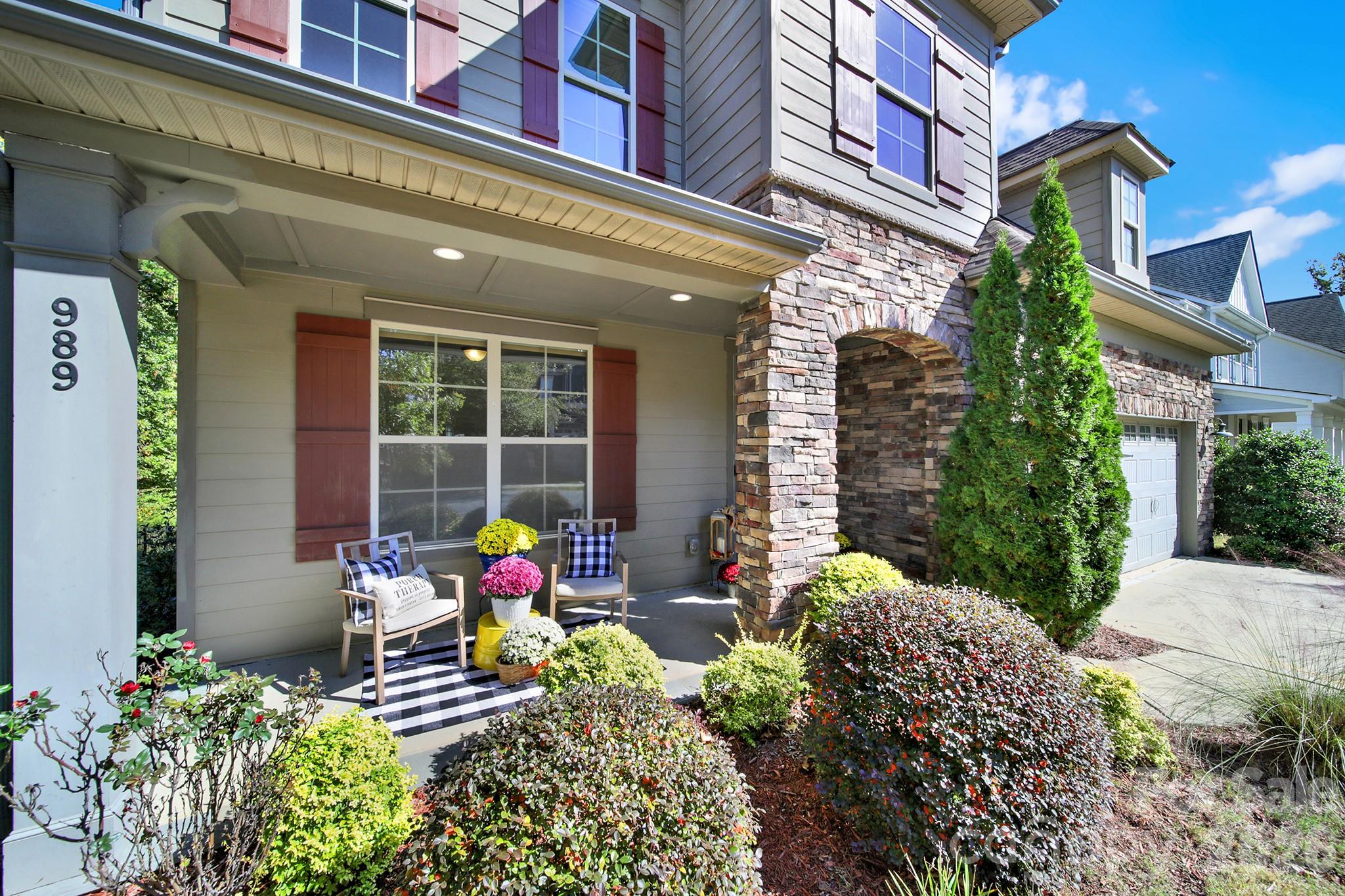 989 Emory Lane Fort Mill, SC 29708 - Photo 2 of 48 front view of a brick building with large windows