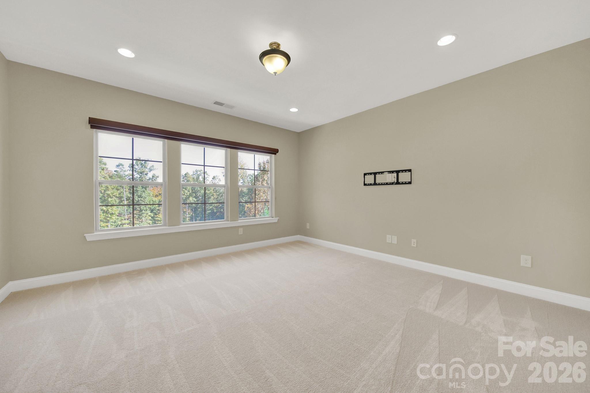 989 Emory Lane Fort Mill, SC 29708 - Photo 21 of 48 a view of an empty room with a window
