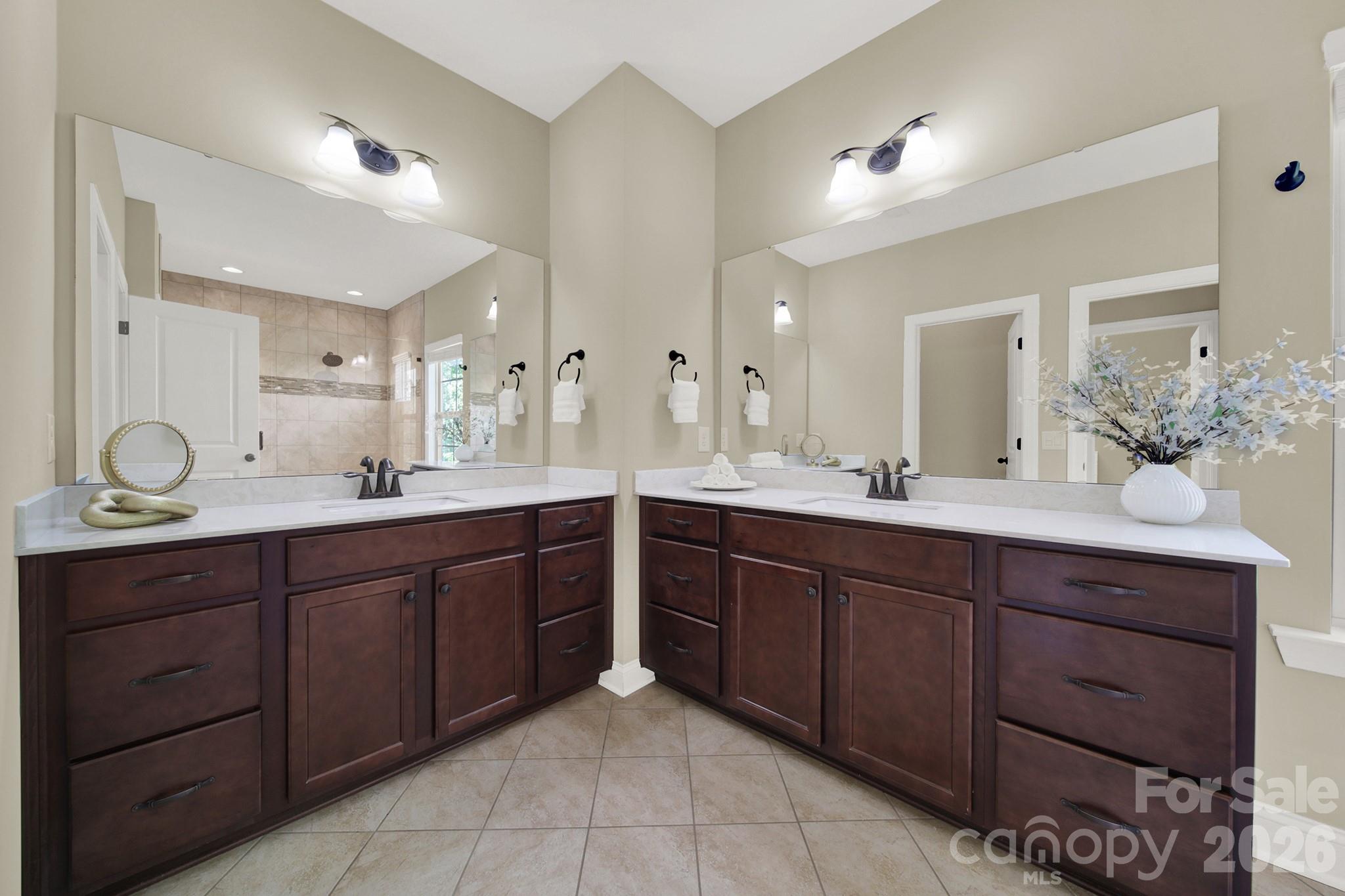 989 Emory Lane Fort Mill, SC 29708 - Photo 23 of 48 a spacious bathroom with a double vanity sink mirror and