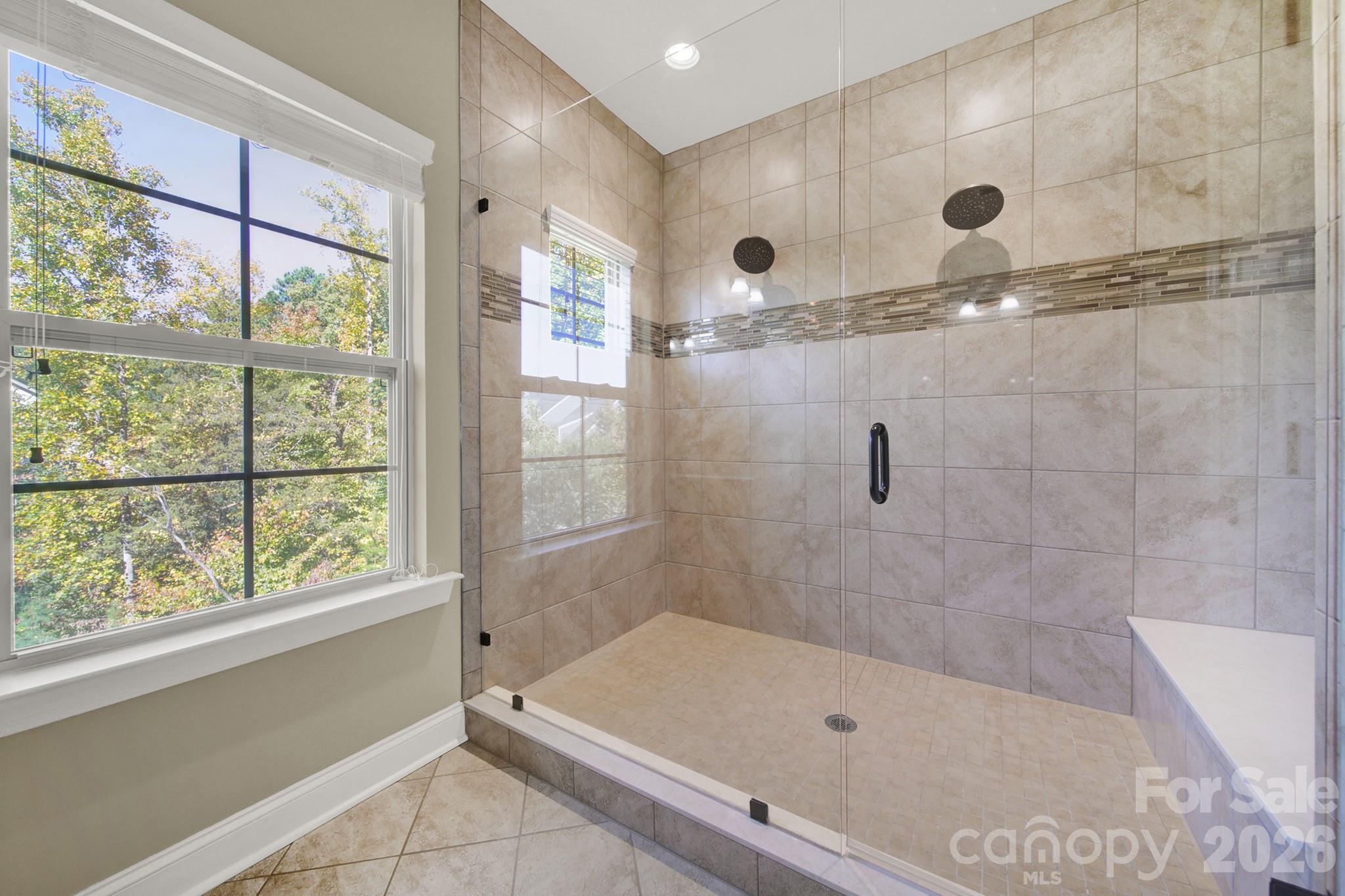 989 Emory Lane Fort Mill, SC 29708 - Photo 24 of 48 a bathroom with a tub and a shower