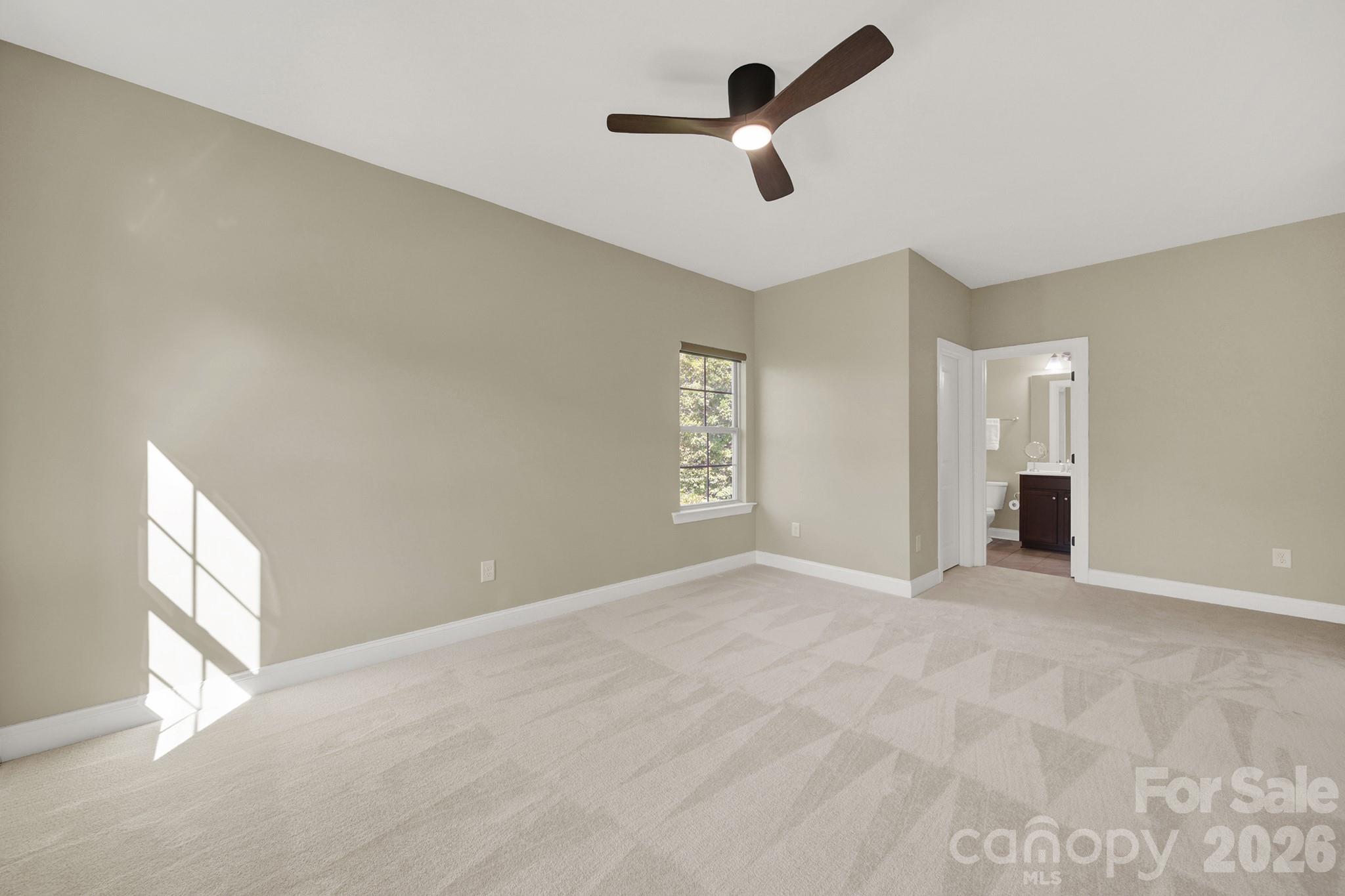 989 Emory Lane Fort Mill, SC 29708 - Photo 27 of 48 a view of an empty room with a window