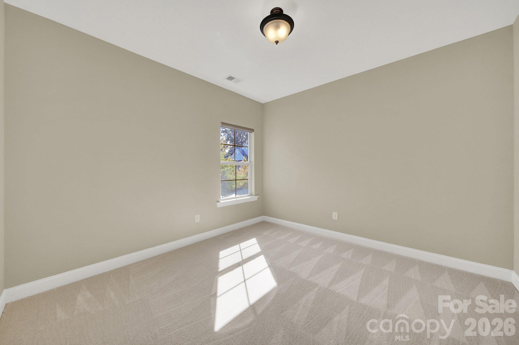 989 Emory Lane Fort Mill, SC 29708 - Photo 36 of 48 an empty room with windows